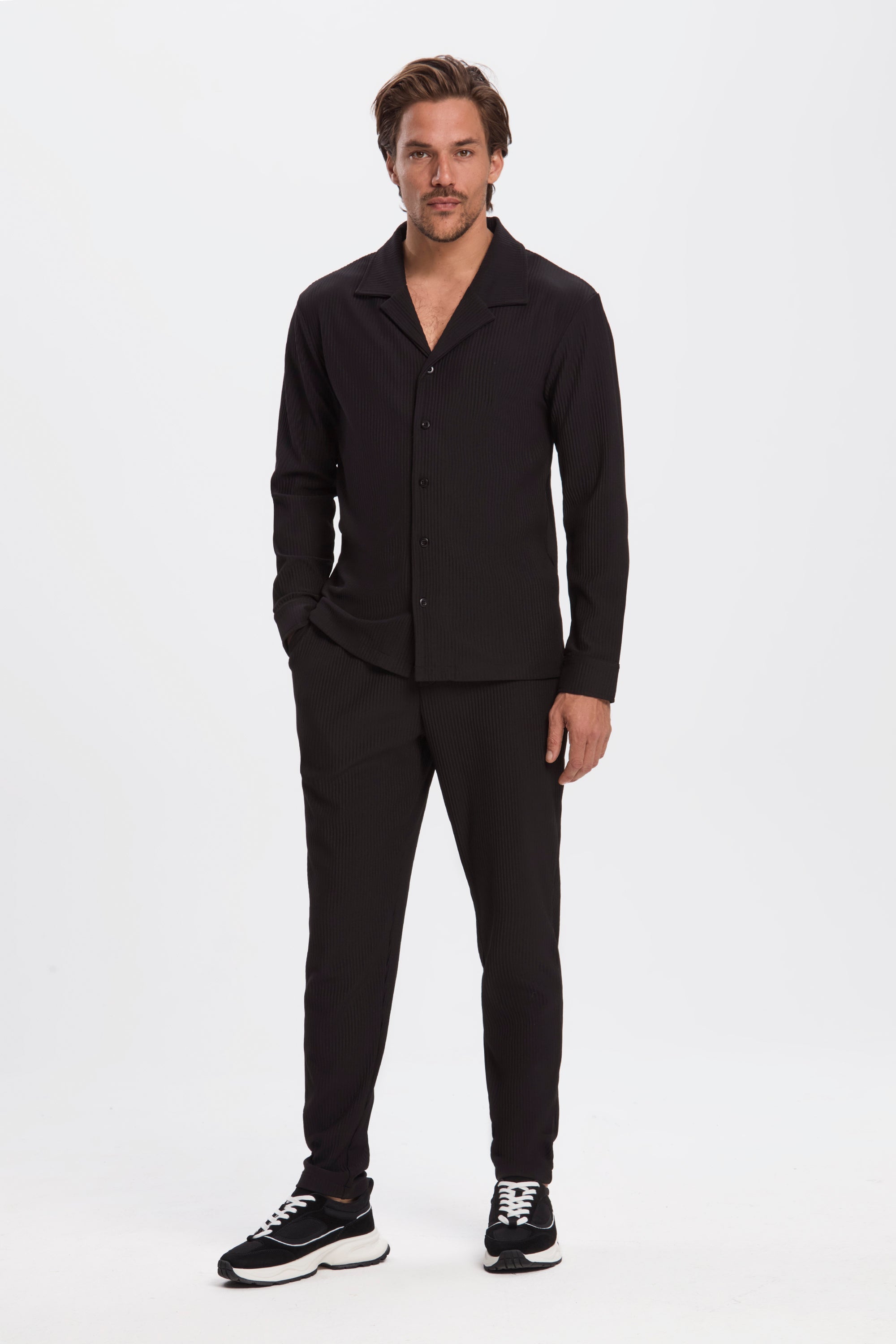 THE PLEATED TROUSERS