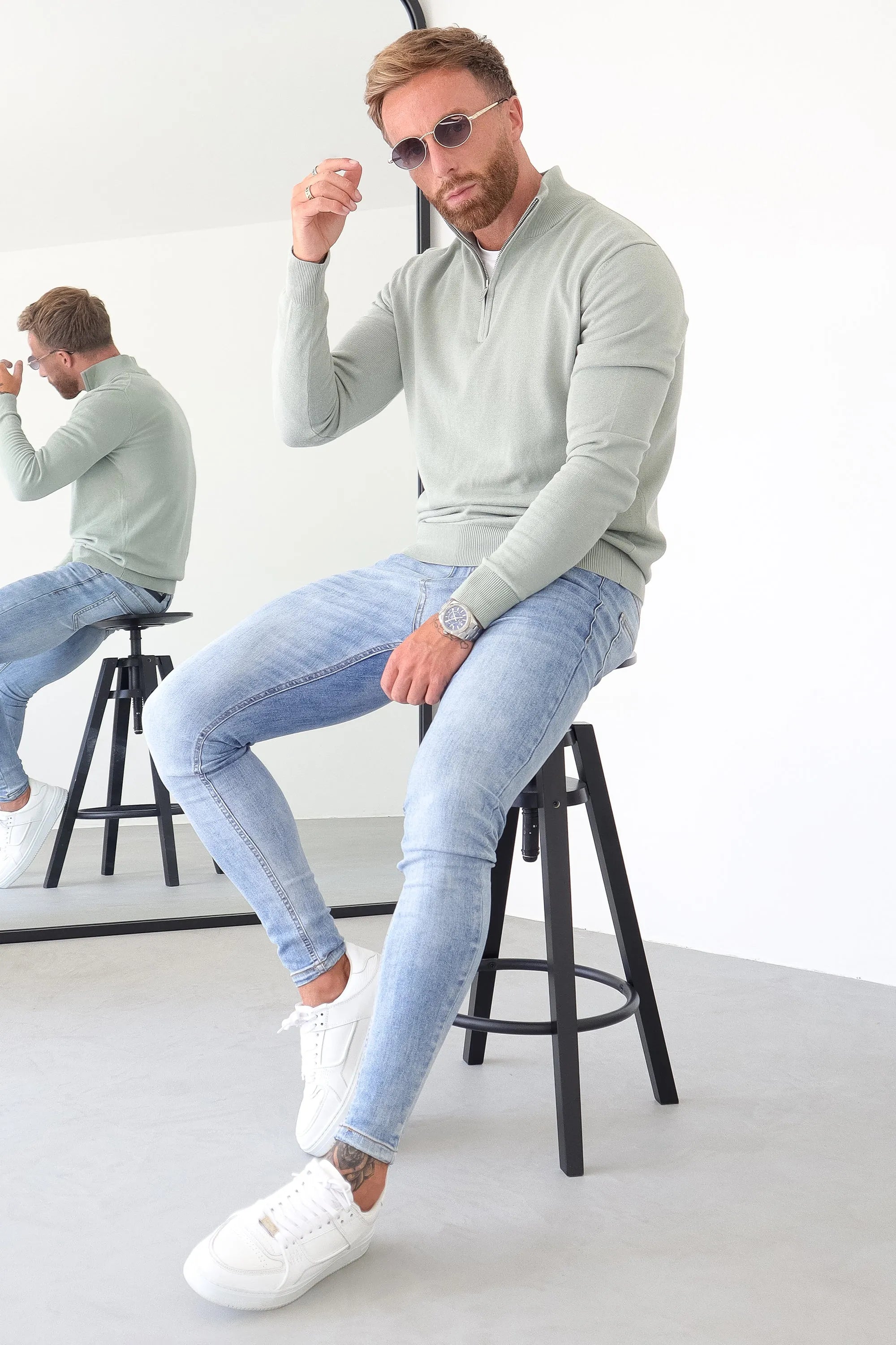 THE SANTONI HALF ZIP SWEATER